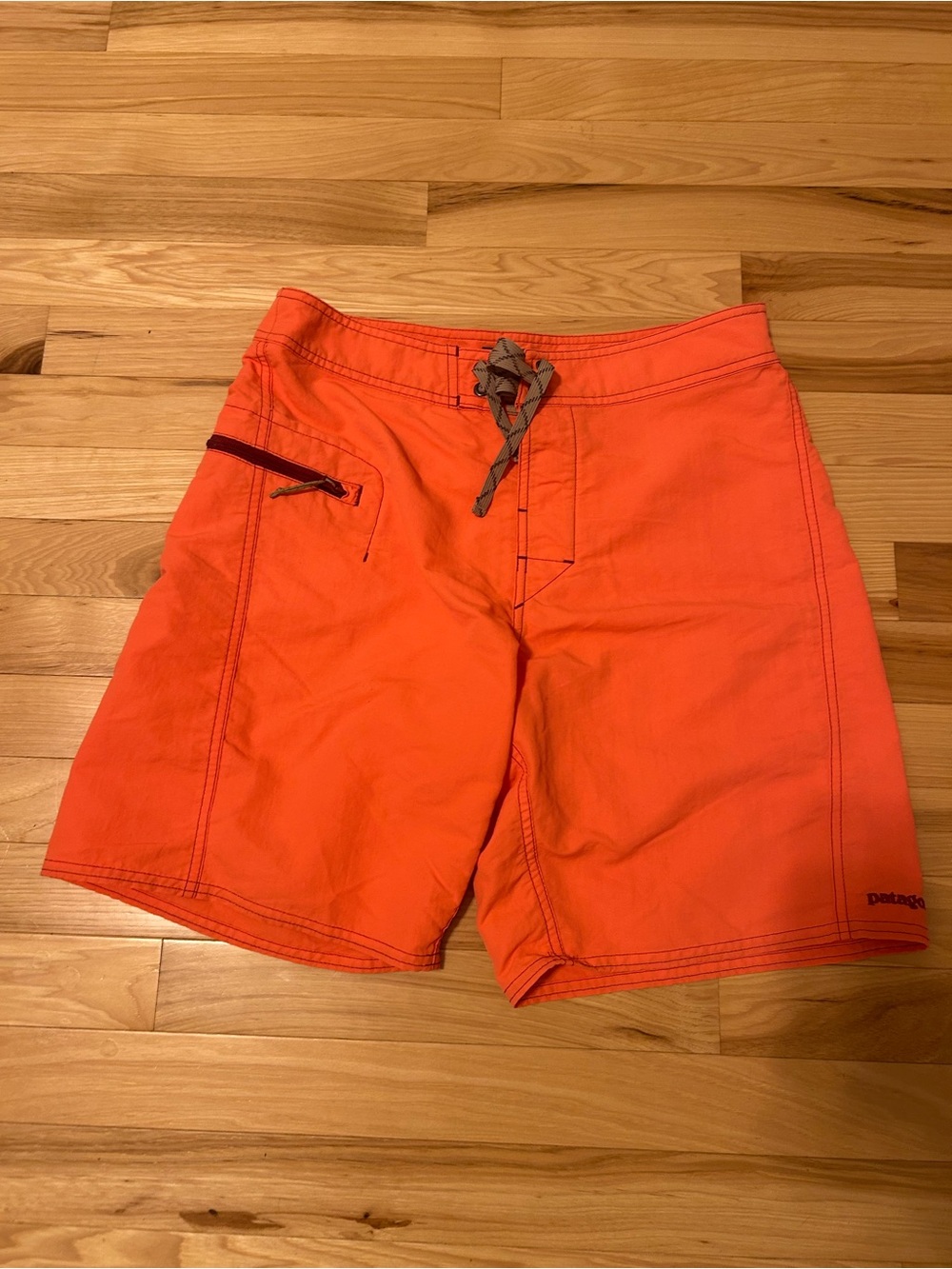 Patagonia Men’s Bright Orange Board Shorts with Gray Drawstring - Picture 1 of 3